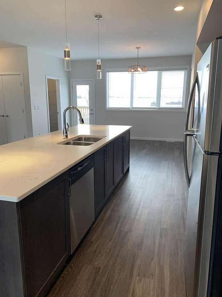 Beautiful Modern 3 Bed Duplex in Starling Community *Tandem Double Garage* - Photo 2 of 48