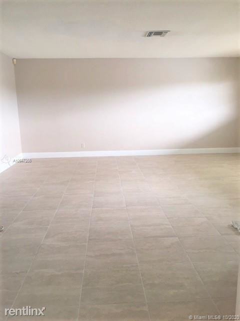 5940 NW 16th Pl - Photo 2 of 6