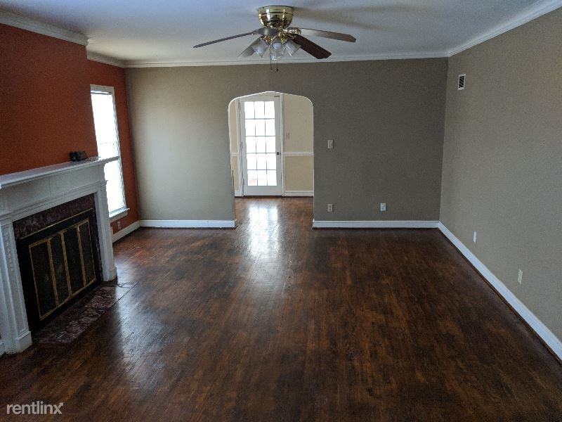 627 E 63rd Ter - Photo 2 of 22