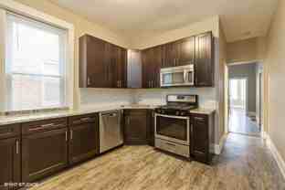 909 N Leavitt - Photo 1 of 1