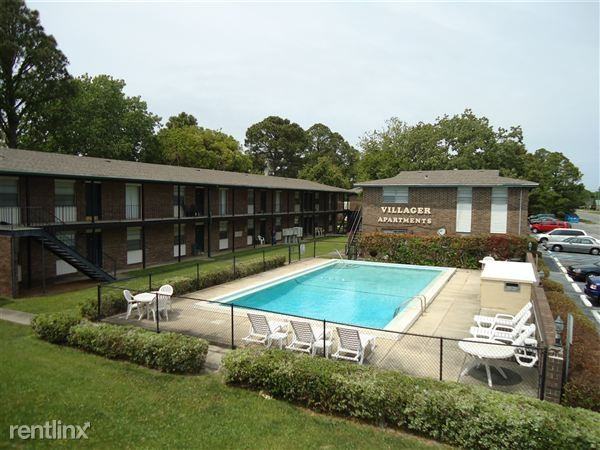 Villager Apartments - Photo 2 of 5