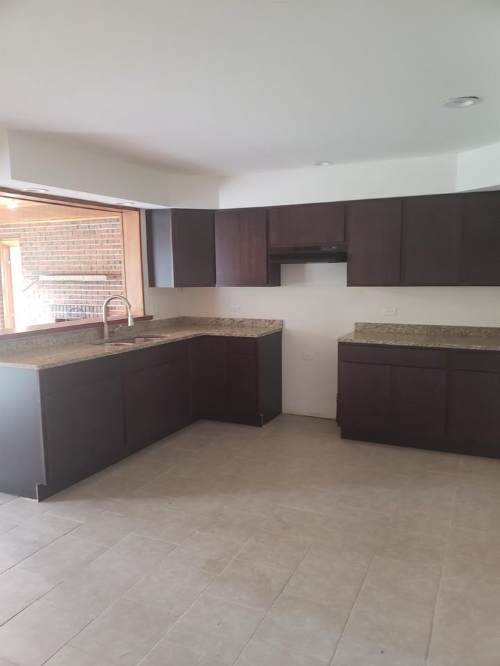 17302 Holmes Ave - Photo 3 of 5