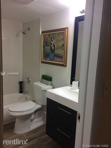 255 SW 7th St - Photo 3 of 13