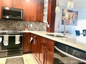 879 Northeast 195th Street - Photo 3 of 17