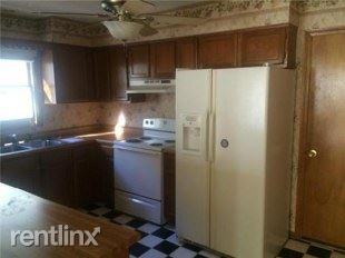 1513 E 123rd Ter - Photo 2 of 10