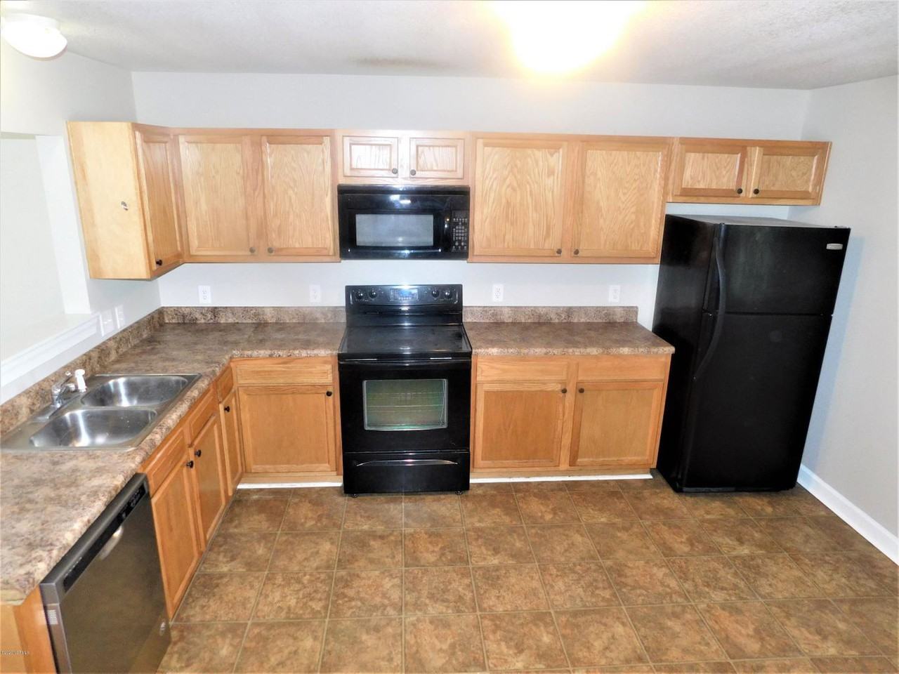 609 Streamwood Drive - Photo 3 of 4