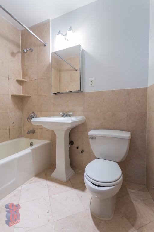 E 25th St #EW - Photo 2 of 8