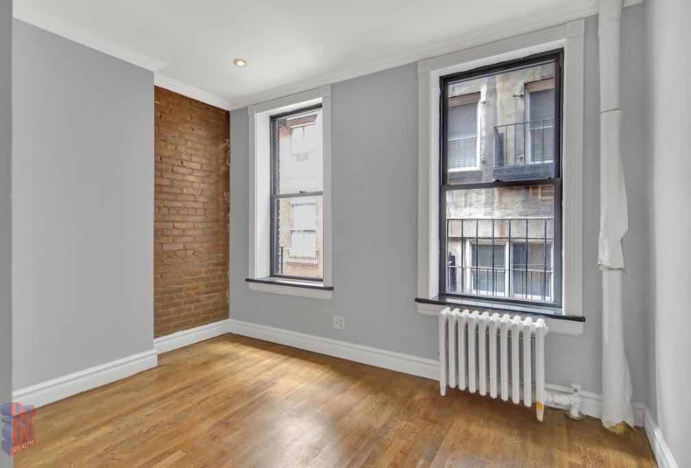 E 23rd St #8 - Photo 7 of 8