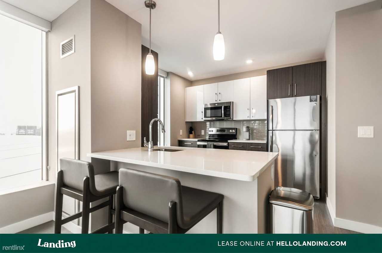 Landing Furnished Apartment The Penny at Jackson Ward Apartments - Photo 2 of 50