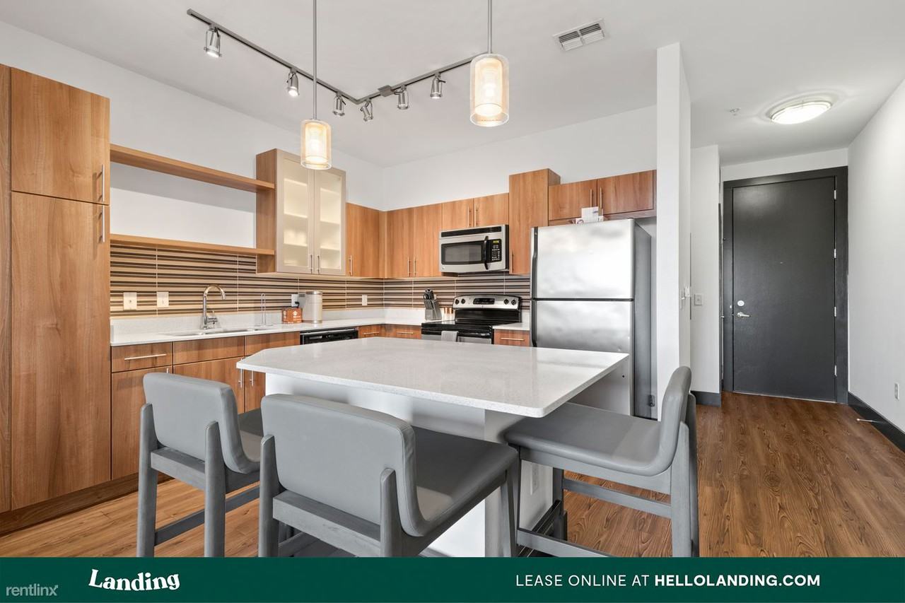 Landing Furnished Apartment 1100 Apex - Photo 2 of 50