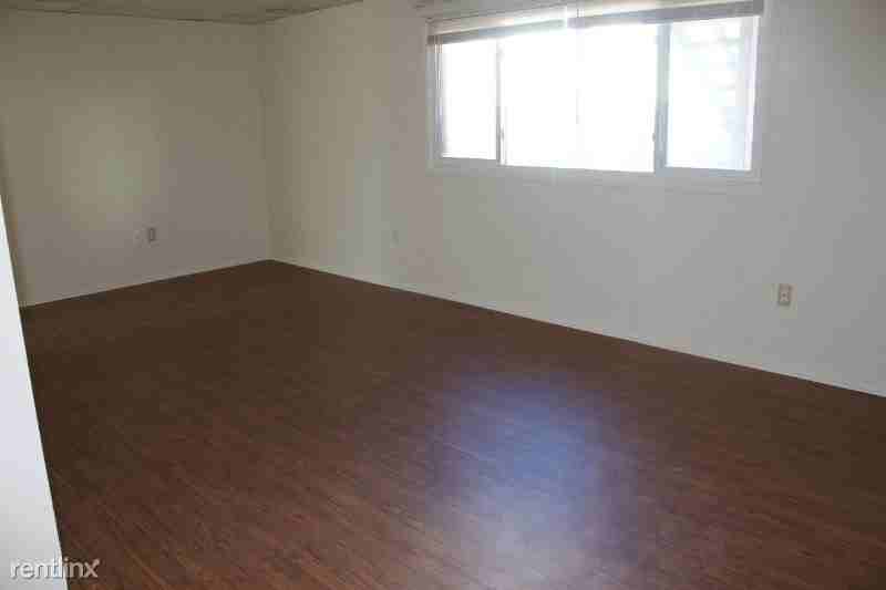 209 E 11th St - Photo 2 of 7