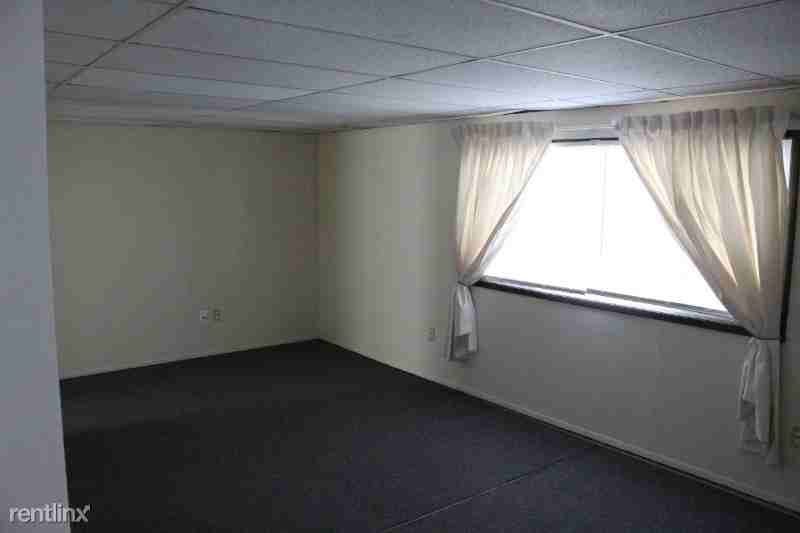 209 E 11th St - Photo 3 of 7