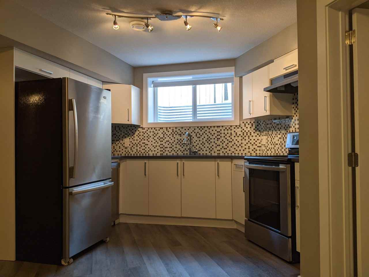INGLEWOOD! NEW 1 BEDROOM LEGAL BASEMENT SUITE - Photo 2 of 17