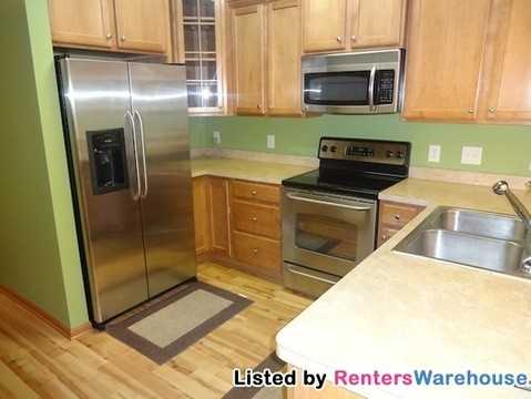 7716 Lachman Ave NE - Photo 3 of 15