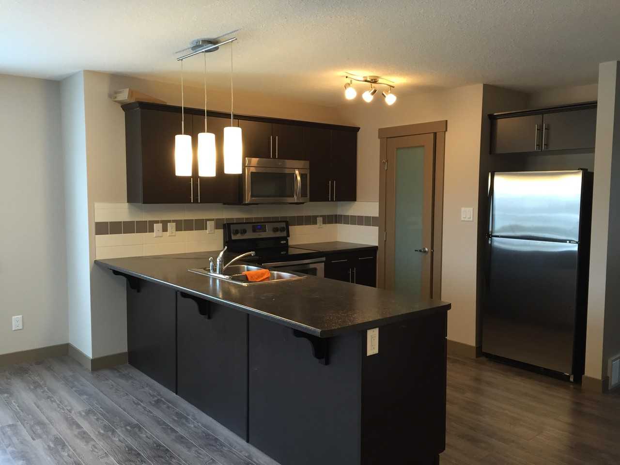 17621 10 Avenue Southwest - Photo 3 of 10