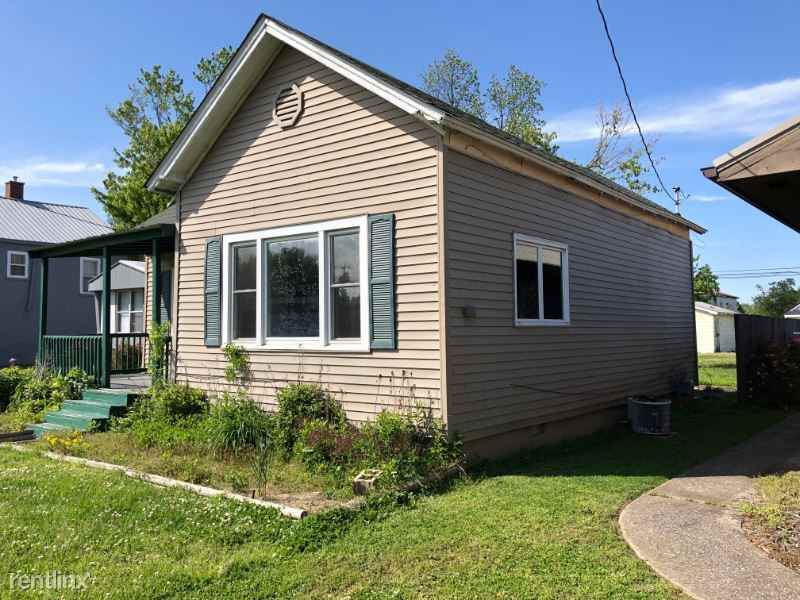 E 9th St - Photo 2 of 14