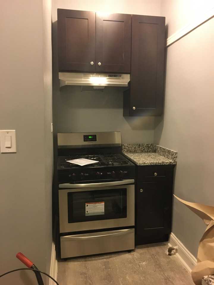410 E 48th Pl #410-3R12 - Photo 3 of 15