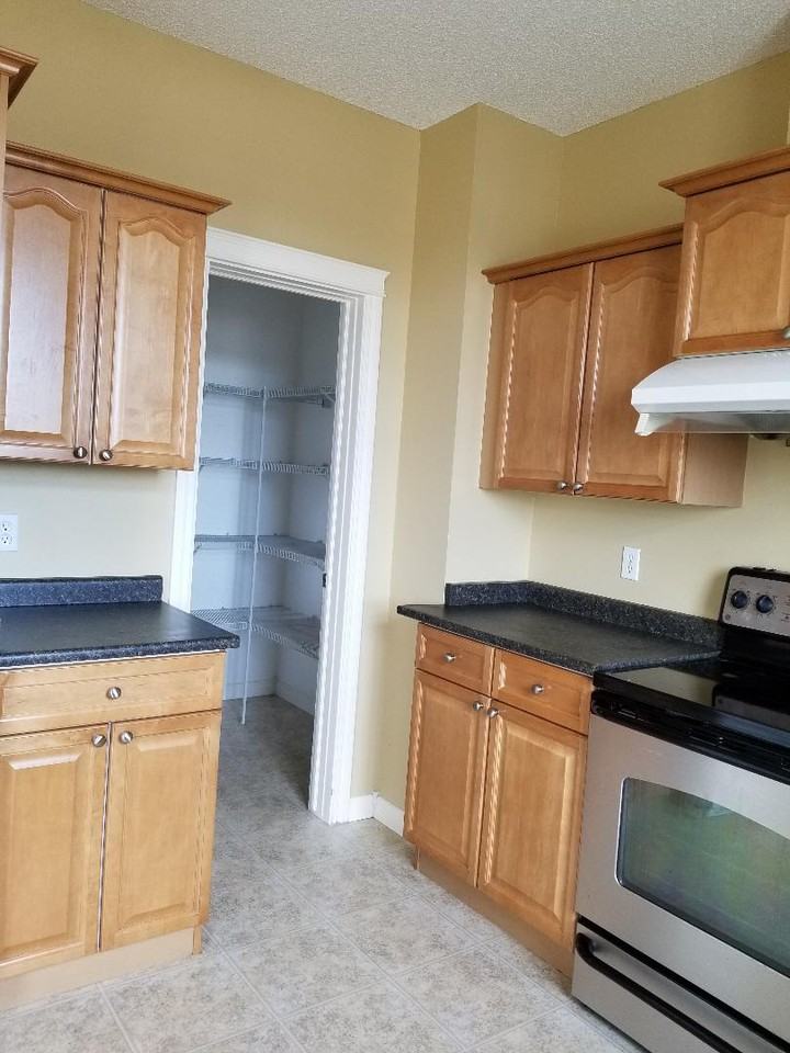 116 6 Avenue Northeast #105 - Photo 3 of 15