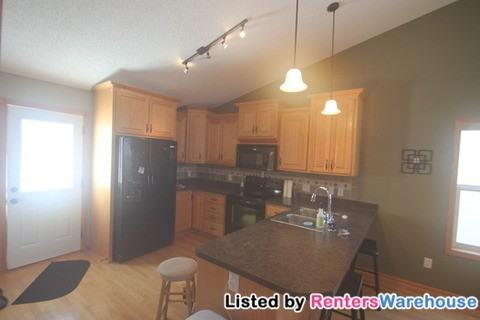 12147 Bataan St NE - Photo 2 of 15