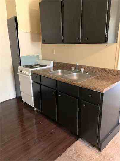 SADDLER APARTMENTS - Photo 3 of 14