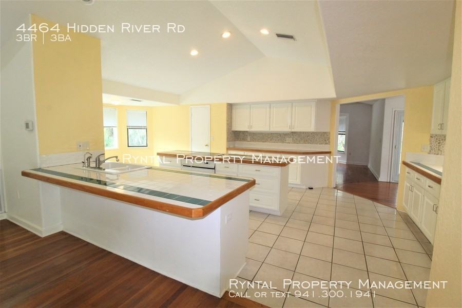 4464 Hidden River Rd - Photo 3 of 27