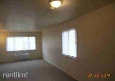 Sunset Arms Apartments - Photo 2 of 3