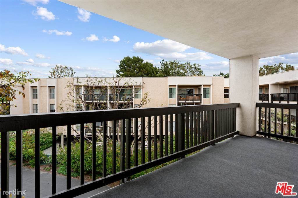 7303 Raintree Cir #303 - Photo 3 of 14