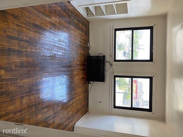 5823 Station St - Photo 3 of 8