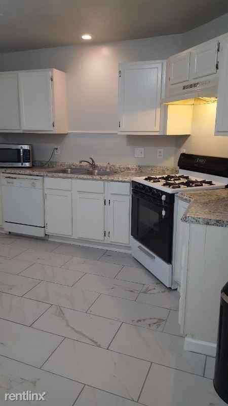 E 26th St - Photo 3 of 15