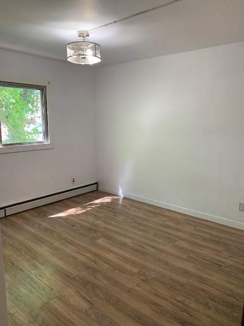 Spruce Manor - Photo 3 of 5