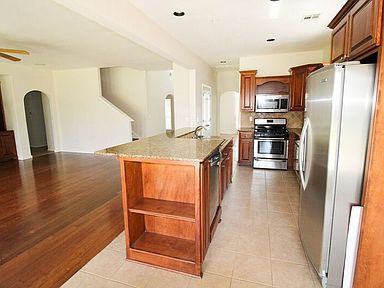 10206 N 142nd East Ave - Photo 3 of 17