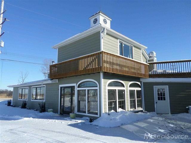 6211 Pointe Tremble Rd - Photo 3 of 21