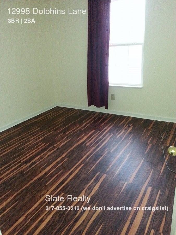 12998 Dolphins Ln - Photo 2 of 12