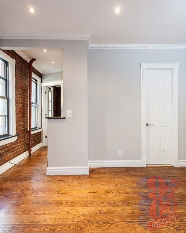 E 13th St #2B - Photo 2 of 6