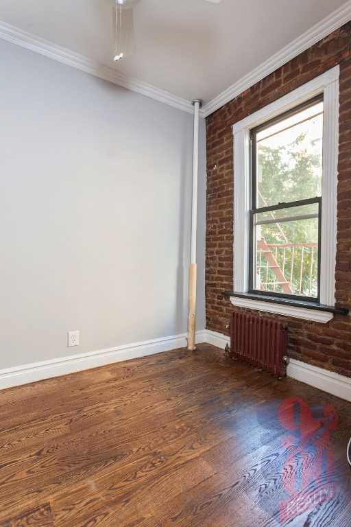 E 13th St #2B - Photo 3 of 6