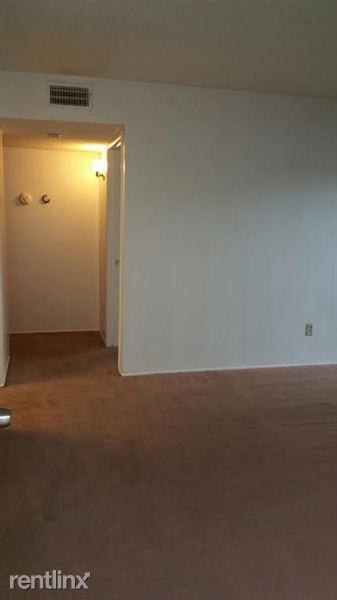 The Woodlands Apartments - Photo 2 of 4