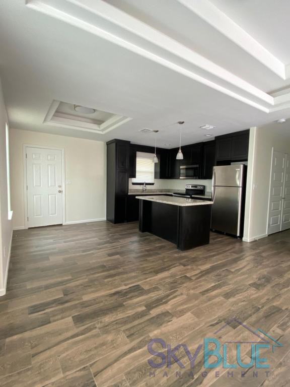 The Hills at Chapin Apartments - Photo 2 of 8