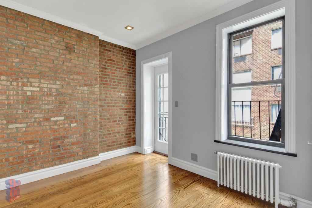 E 23rd St #18 - Photo 2 of 8