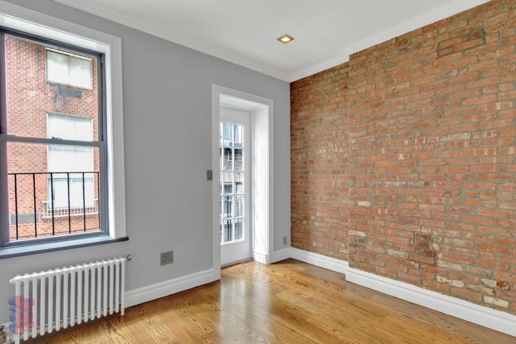 E 23rd St #18 - Photo 3 of 8