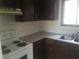 featured image of 8911 8911 102 Ave. Village St. John #8911