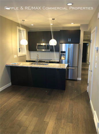 1317B 20 Ave Nw - Photo 2 of 8