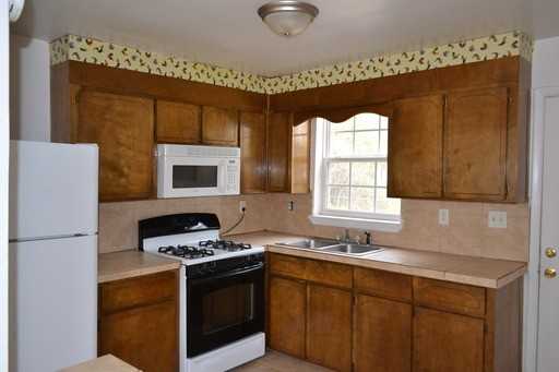 317 Pleasant St - Photo 2 of 8