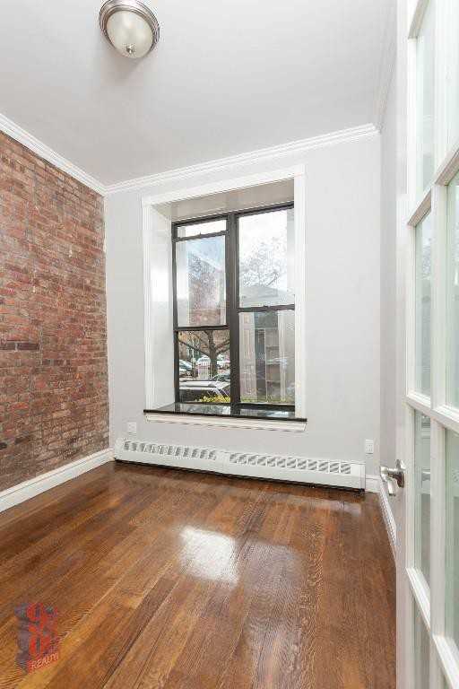 E 28th St #1B - Photo 4 of 5