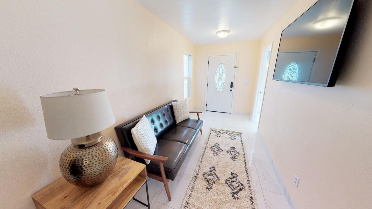 Bright Oakland home one block from BART - Photo 2 of 21