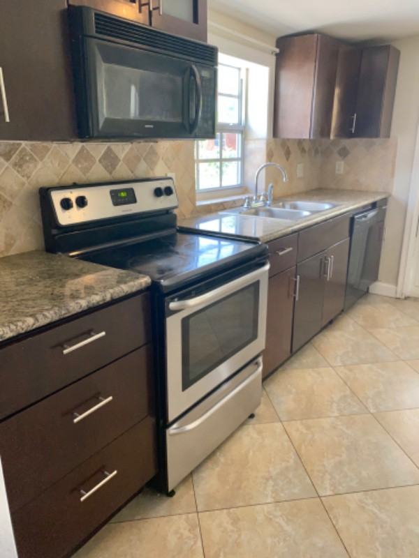 1430 Ne 41st Dr - Photo 5 of 15