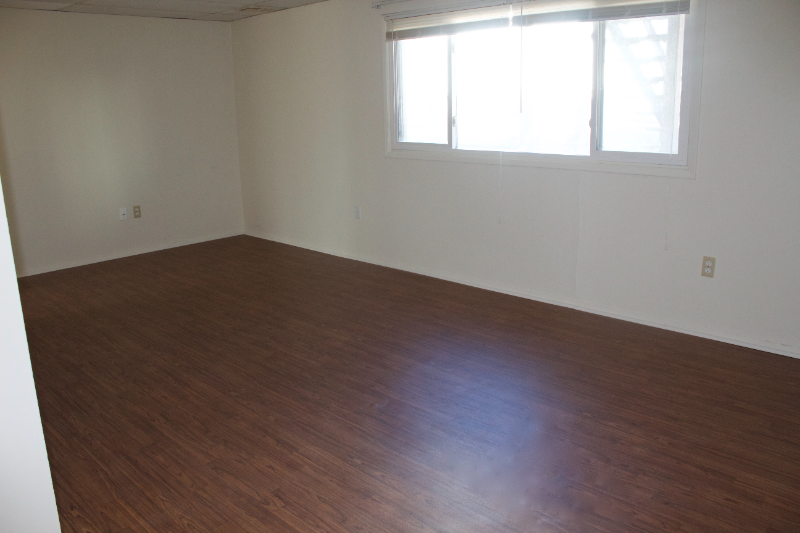 209 E 11th St - Photo 2 of 7