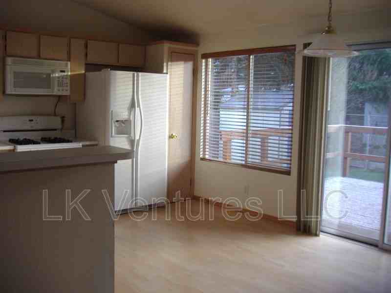 6906 Troy Ln Ne - Photo 2 of 9