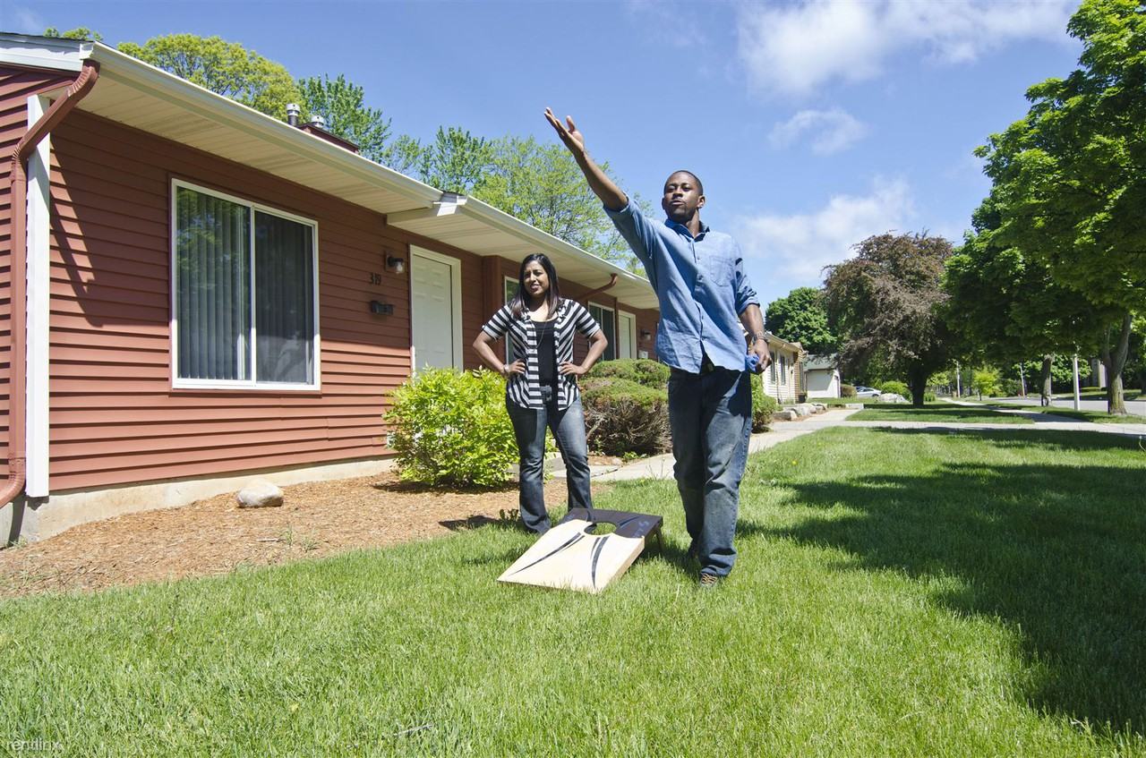Spartan Duplexes - Photo 2 of 11