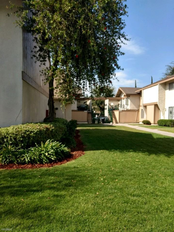 Village Green Apartments - Photo 2 of 18