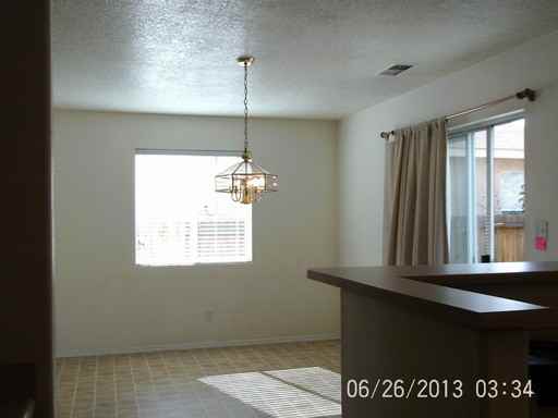 10743 Stonebrook Pl NW - Photo 3 of 12